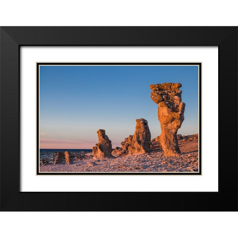 Sweden-Faro Island-Langhammars Area-Langhammar coastal limestone rauk rock-sunset Black Modern Wood Framed Art Print with Double Matting by Bibikow, Walter