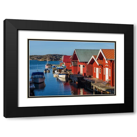 Sweden-Bohuslan-Kungshamn-red fishing shacks in the Fisketangen-old fishermans neighborhood Black Modern Wood Framed Art Print with Double Matting by Bibikow, Walter