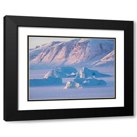 Icebergs frozen into the sea ice of the Uummannaq Fjord System during winter  Black Modern Wood Framed Art Print with Double Matting by Zwick, Martin