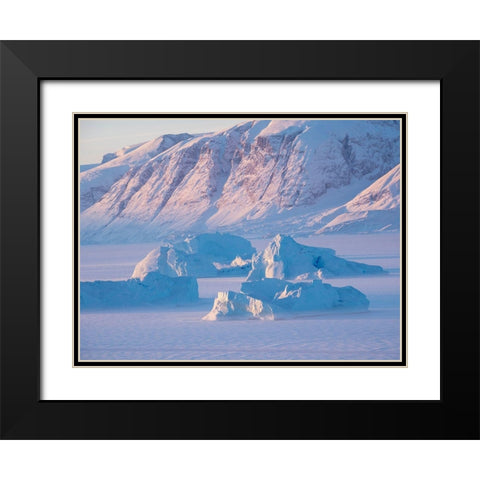 Icebergs frozen into the sea ice of the Uummannaq Fjord System during winter  Black Modern Wood Framed Art Print with Double Matting by Zwick, Martin