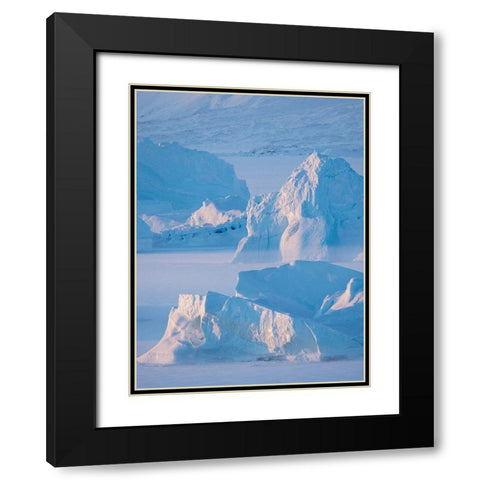 Icebergs frozen into the sea ice of the Uummannaq Fjord System during winter  Black Modern Wood Framed Art Print with Double Matting by Zwick, Martin