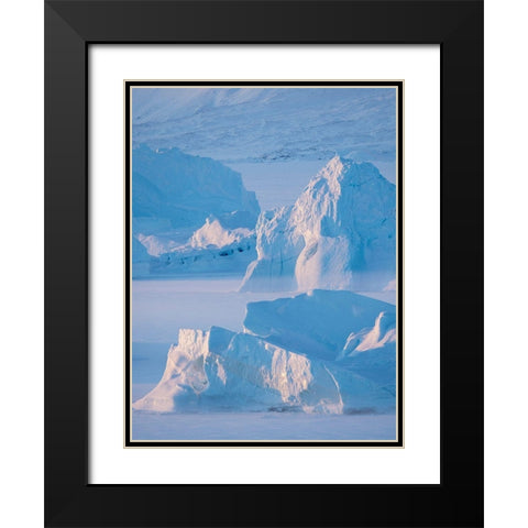 Icebergs frozen into the sea ice of the Uummannaq Fjord System during winter  Black Modern Wood Framed Art Print with Double Matting by Zwick, Martin