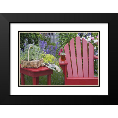 Ice tea rests on red chair while gardening Black Modern Wood Framed Art Print with Double Matting by Paulson, Don