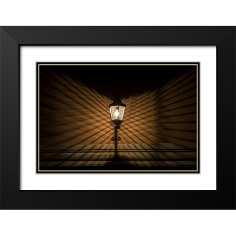 Mexico Wire cage lamp at night creates shadows Black Modern Wood Framed Art Print with Double Matting by Young, Bill