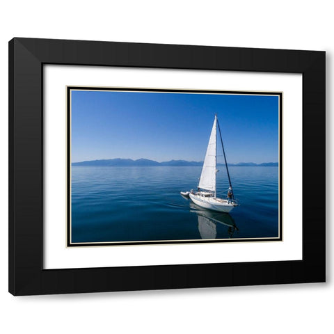Alaska-Aerial view of Gulf 32 pilothouse boat motoring and sailing in calm waters of Frederick Sound Black Modern Wood Framed Art Print with Double Matting by Souders, Paul