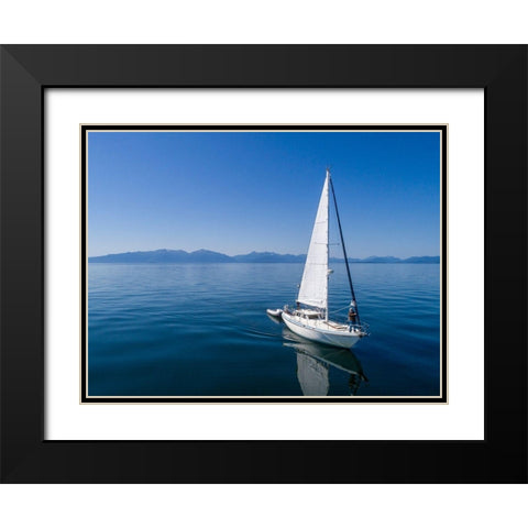 Alaska-Aerial view of Gulf 32 pilothouse boat motoring and sailing in calm waters of Frederick Sound Black Modern Wood Framed Art Print with Double Matting by Souders, Paul