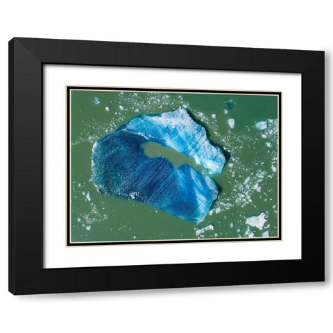 Alaska-Tracy Arm-Aerial view of floating iceberg calved from South Sawyer Glacier in Tracy Arm Black Modern Wood Framed Art Print with Double Matting by Souders, Paul
