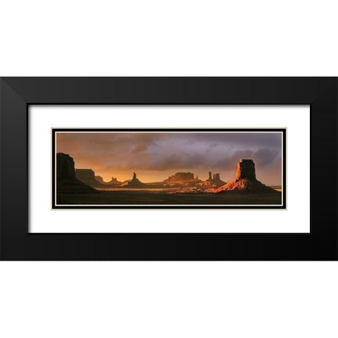 Last light bathes Monument Valley in deep oranges and lavenders on the Arizona-Utah border Black Modern Wood Framed Art Print with Double Matting by SMO
