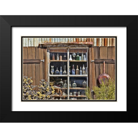 CA, Randsburg Bottles in window of a store Black Modern Wood Framed Art Print with Double Matting by Paulson, Don
