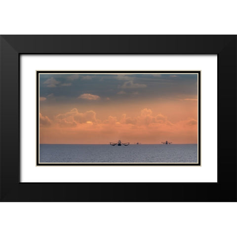 Fishing boats deep out to sea against the backdrop of dramatic sunset clouds and sky Black Modern Wood Framed Art Print with Double Matting by Haddad, Sheila