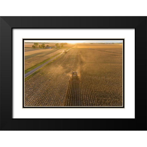 Aerial view of combine harvesting corn field at sunset-Marion County-Illinois Black Modern Wood Framed Art Print with Double Matting by Day, Richard and Susan
