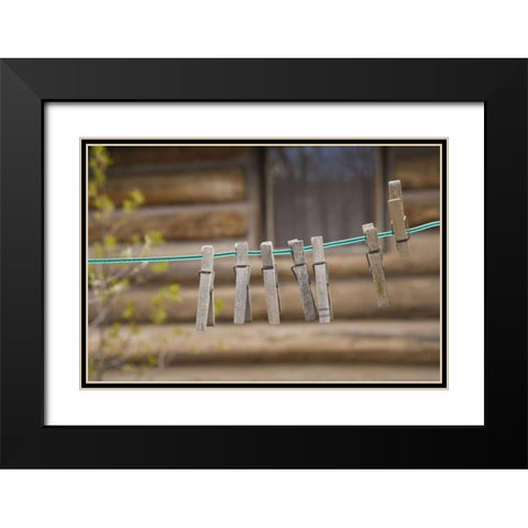 MT, Clothes pins on a clothesline by a log cabin Black Modern Wood Framed Art Print with Double Matting by Paulson, Don