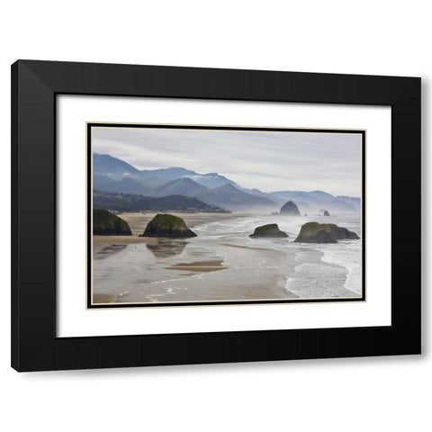 Oregon, Cannon Beach Fog rises over coastline Black Modern Wood Framed Art Print with Double Matting by Carter, Jean