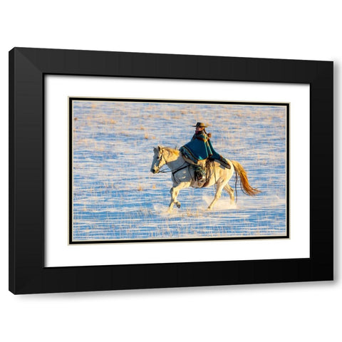 USA- Shell- Wyoming. Hideout Ranch cowgirl riding her horse in the snow.  Black Modern Wood Framed Art Print with Double Matting by Gulin, Darrell