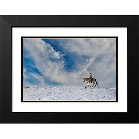 USA- Shell- Wyoming. Hideout Ranch cowgirl on horseback riding on ridgeline snow.  Black Modern Wood Framed Art Print with Double Matting by Gulin, Darrell