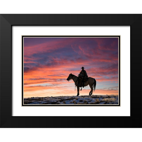 USA- Shell- Wyoming. Hideout Ranch cowgirl silhouetted on horseback at sunset.  Black Modern Wood Framed Art Print with Double Matting by Gulin, Darrell