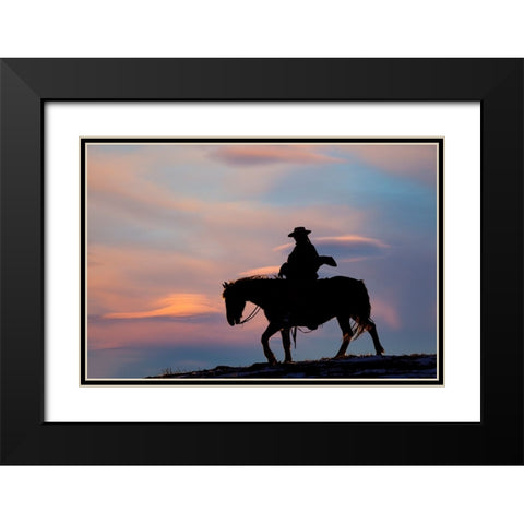 USA- Shell- Wyoming. Hideout Ranch cowgirl silhouetted on horseback at sunset.  Black Modern Wood Framed Art Print with Double Matting by Gulin, Darrell