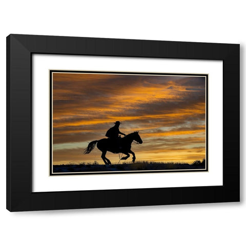 USA- Shell- Wyoming. Hideout Ranch cowgirl silhouetted on horseback at sunset.  Black Modern Wood Framed Art Print with Double Matting by Gulin, Darrell