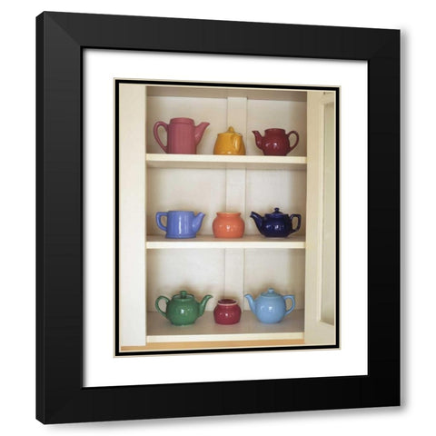 Antique ceramic teapots and sugar bowls in cupboard Black Modern Wood Framed Art Print with Double Matting by Terrill, Steve