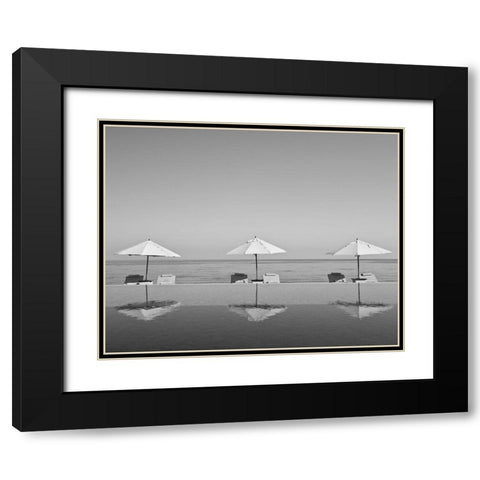 Umbrellas by the Sea Black Modern Wood Framed Art Print with Double Matting by Anonymous
