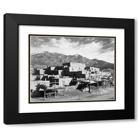 Full view of city, mountains in background, Taos Pueblo National Historic Landmark, New Mexico, 1941 Black Modern Wood Framed Art Print with Double Matting by Adams, Ansel