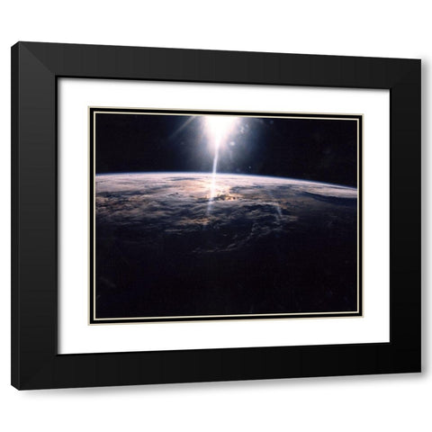 Sunlight over Earth as seen by Discovery crew Black Modern Wood Framed Art Print with Double Matting by NASA