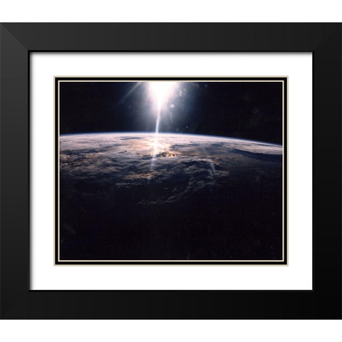 Sunlight over Earth as seen by Discovery crew Black Modern Wood Framed Art Print with Double Matting by NASA