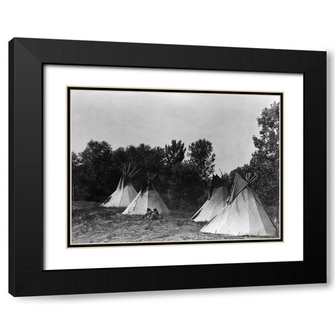 An Assiniboin camp containing four tepees with Indians seated on ground Black Modern Wood Framed Art Print with Double Matting by Curtis, Edward