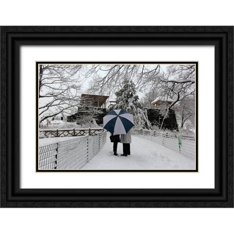 Central Park Couple In The Snow Black Ornate Wood Framed Art Print with Double Matting by Goldwitz, Robert