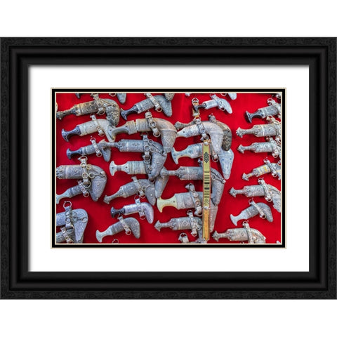 Middle East-Arabian Peninsula-Oman-Ad Dakhiliyah-Nizwa-Khanjar knives for sale Black Ornate Wood Framed Art Print with Double Matting by Wilson, Emily M.