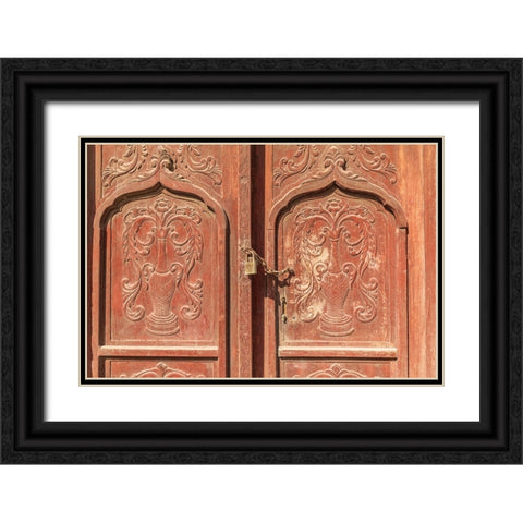 Middle East-Arabian Peninsula-Al Batinah South-Carved wooden door on a building in Oman Black Ornate Wood Framed Art Print with Double Matting by Wilson, Emily M.