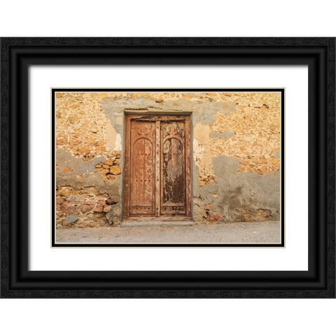 Middle East-Arabian Peninsula-Al Batinah South-Old wooden door on a building in Oman Black Ornate Wood Framed Art Print with Double Matting by Wilson, Emily M.