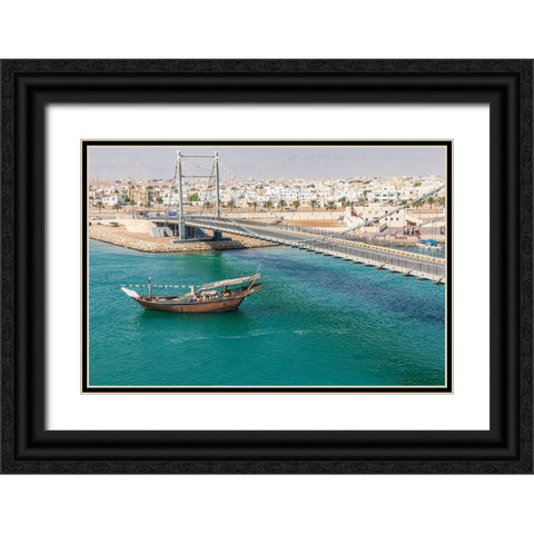 Middle East-Arabian Peninsula-Oman-Al Batinah South-Dhow passing under a suspension bridge Black Ornate Wood Framed Art Print with Double Matting by Wilson, Emily M.