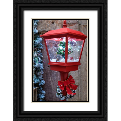 Strasbourg-France Christmas red lamp post with blowing snow inside Black Ornate Wood Framed Art Print with Double Matting by McRoberts, Julien