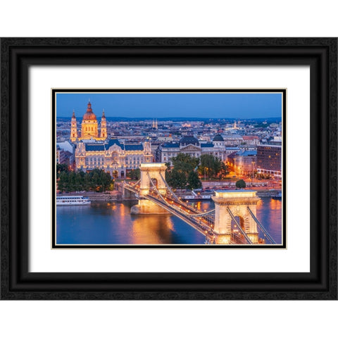 Hungary-Budapest-Szechenyi Chain Bridge across the Danube River-illuminated at night-built between  Black Ornate Wood Framed Art Print with Double Matting by Haseltine, Tom