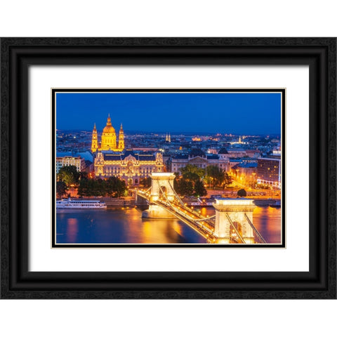Hungary-Budapest-Szechenyi Chain Bridge across the Danube River-illuminated at night-built between  Black Ornate Wood Framed Art Print with Double Matting by Haseltine, Tom