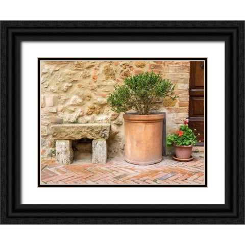 Italy-Tuscany-Pienza Potted plants and stone bench along the streets Black Ornate Wood Framed Art Print with Double Matting by Eggers, Julie