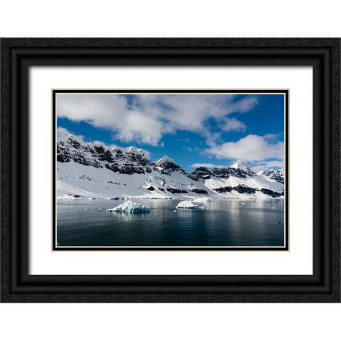A view of the mountain peaks of Burgerbukta Black Ornate Wood Framed Art Print with Double Matting by Pitamitz, Sergio