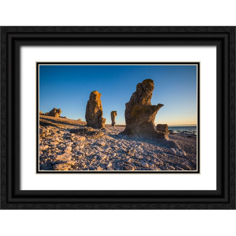 Sweden-Faro Island-Langhammars Area-Langhammar coastal limestone rauk rock-sunset Black Ornate Wood Framed Art Print with Double Matting by Bibikow, Walter