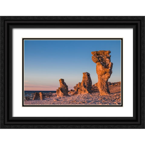Sweden-Faro Island-Langhammars Area-Langhammar coastal limestone rauk rock-sunset Black Ornate Wood Framed Art Print with Double Matting by Bibikow, Walter