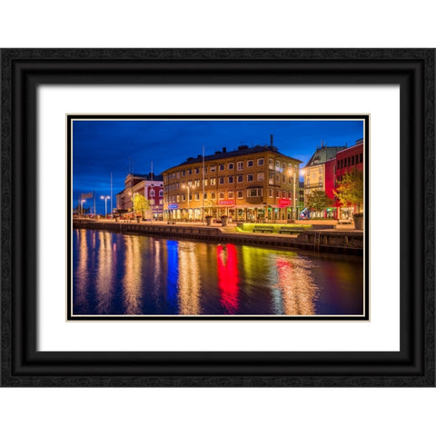 Sweden-Lake Vattern Area-Jonkoping-renovated harbor area along Munksjon Bay-dusk Black Ornate Wood Framed Art Print with Double Matting by Bibikow, Walter