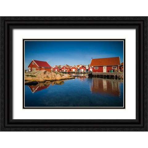 Sweden-Bohuslan-Kungshamn-red fishing shacks in the Fisketangen-old fishermans neighborhood Black Ornate Wood Framed Art Print with Double Matting by Bibikow, Walter