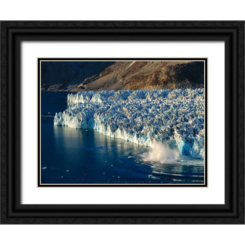 Ice calving. Knud Rasmussen Glacier-Sermiligaaq Fjord- Ammassalik- Danish Territory. Black Ornate Wood Framed Art Print with Double Matting by Zwick, Martin