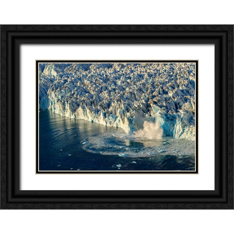 Ice calving. Knud Rasmussen Glacier-Sermiligaaq Fjord- Ammassalik- Danish Territory. Black Ornate Wood Framed Art Print with Double Matting by Zwick, Martin