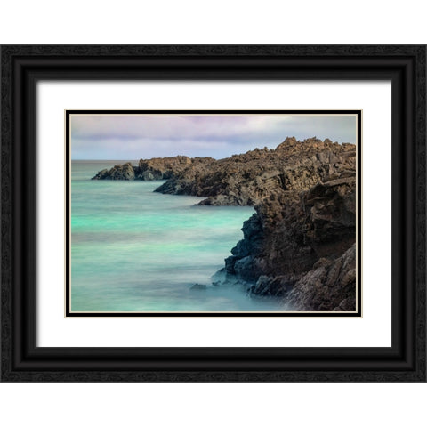 Lava rocks along tranquil shoreline of San Cristobal Island-Galapagos-Ecuador Black Ornate Wood Framed Art Print with Double Matting by Jones, Adam