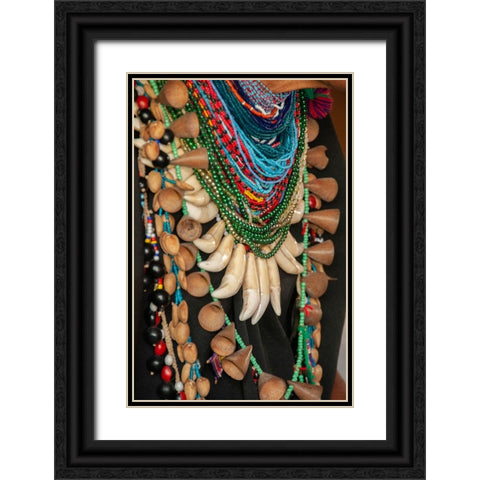 The elaborate regalia of a shaman in the Amazon jungle features jaguar teeth and beads. Black Ornate Wood Framed Art Print with Double Matting by Sederquist, Betty