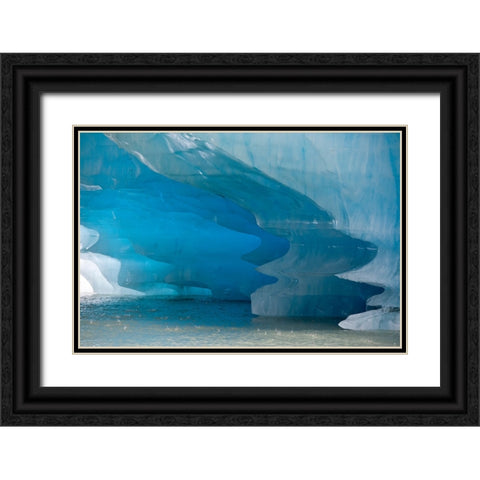 Melting patterns are amazing on this iceberg in Shakes Lake. Black Ornate Wood Framed Art Print with Double Matting by Sederquist, Betty