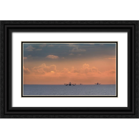 Fishing boats deep out to sea against the backdrop of dramatic sunset clouds and sky Black Ornate Wood Framed Art Print with Double Matting by Haddad, Sheila