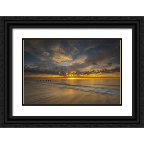 USA-New Jersey-Cape May National Seashore Sunrise on pier posts on ocean shore Black Ornate Wood Framed Art Print with Double Matting by Jaynes Gallery