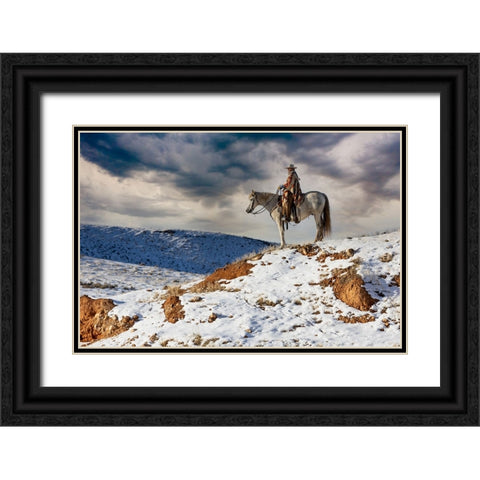 USA- Shell- Wyoming. Hideout Ranch cowgirl on horseback riding on ridgeline snow.  Black Ornate Wood Framed Art Print with Double Matting by Gulin, Darrell